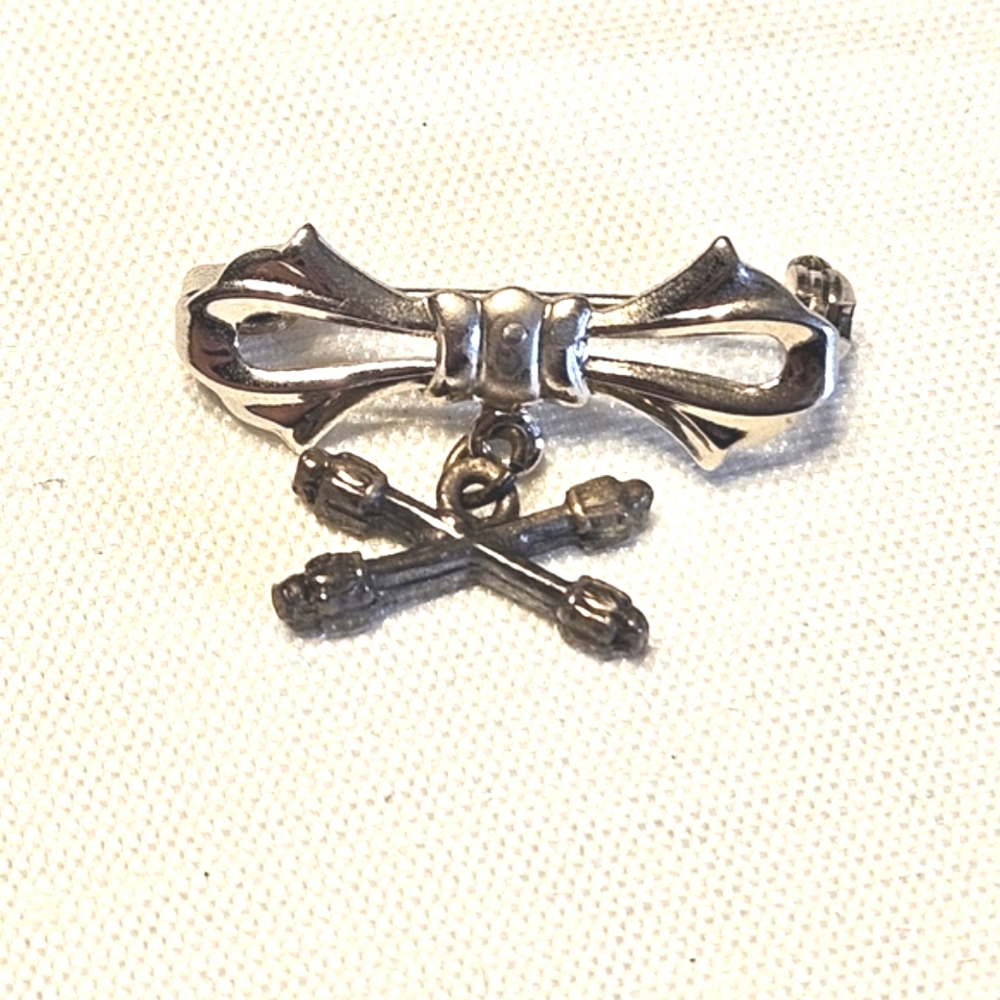 Vintage Silver-Tone Bow Pin with Crossed Batons Charm